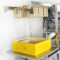 Deboxer honingframeheffer voor volautomatische pneumatische ontzegelmachines