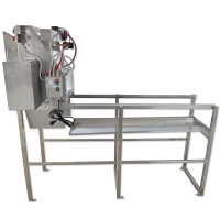 Fully automatic uncapping machine with heated swing blade...